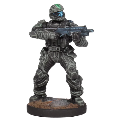 A detailed miniature figure of a Halo ODST trooper in dark camouflage armor stands ready holding a rifle on a round base