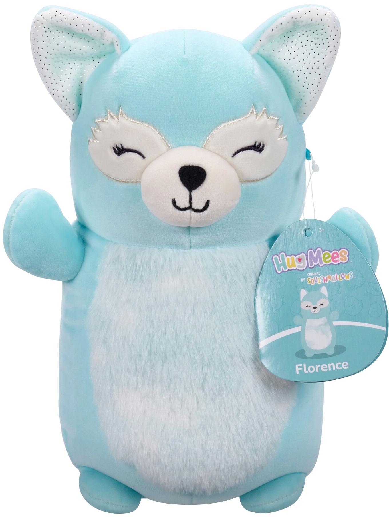 Light blue Squishmallows Hug Mees Florence fox plush toy with white belly, winking expression and attached tag
