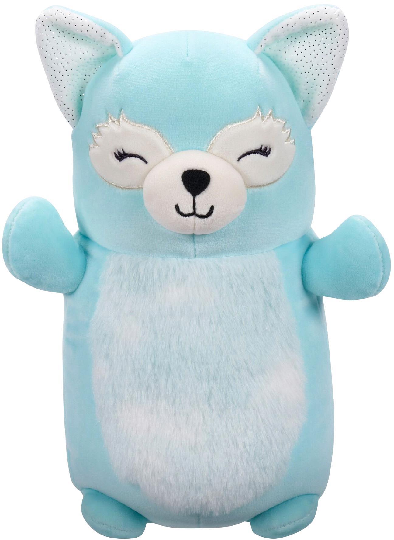 Light blue plush stuffed animal with a furry belly and closed eyes, standing with arms open