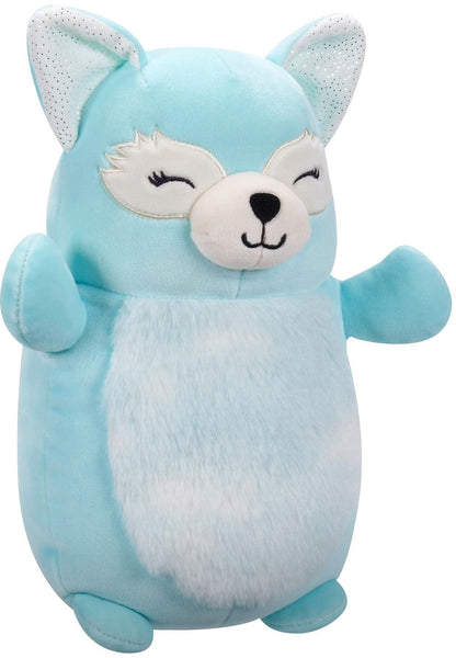 Cuddly blue fox plush toy with white belly and closed eyes, standing with open arms