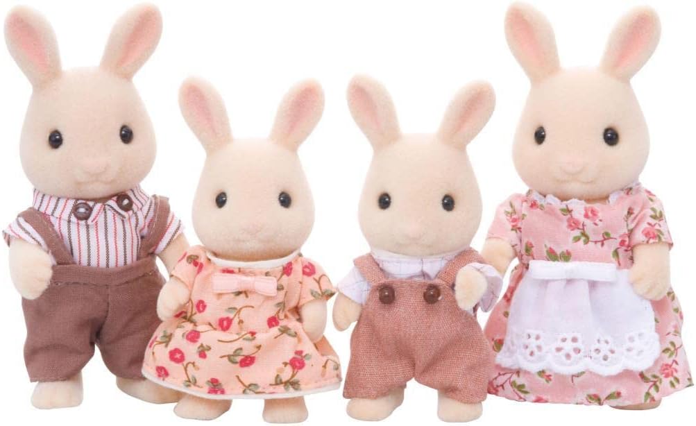 Four flocked Milk Rabbit Family toy figures dressed as a family in detailed fabric outfits