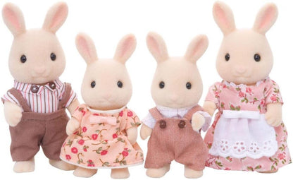 Four flocked Milk Rabbit Family toy figures dressed as a family in detailed fabric outfits