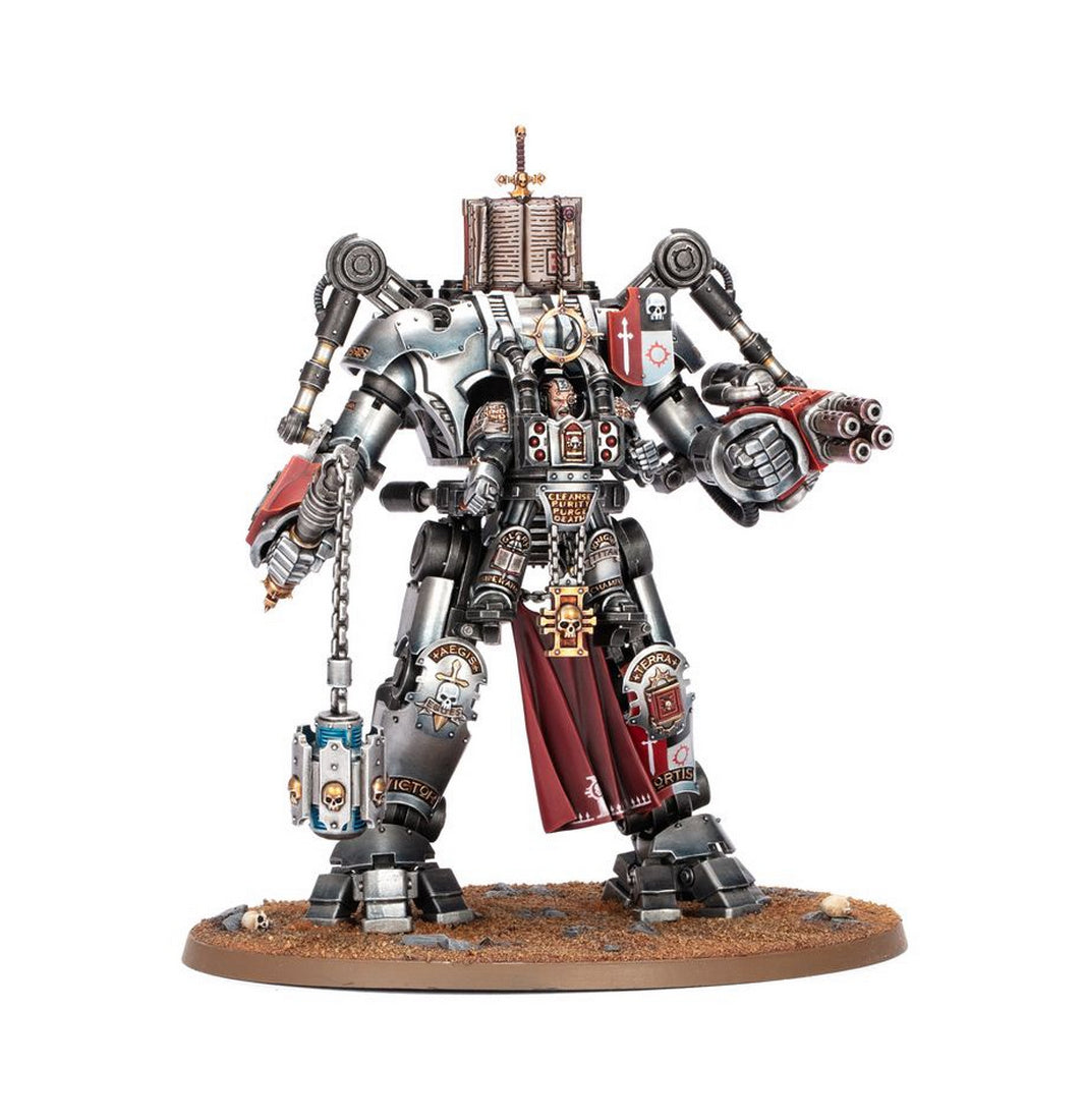 Heavily armored silver Grey Knights Dreadknight miniature, armed with a multi-barrel gun and chained weapon