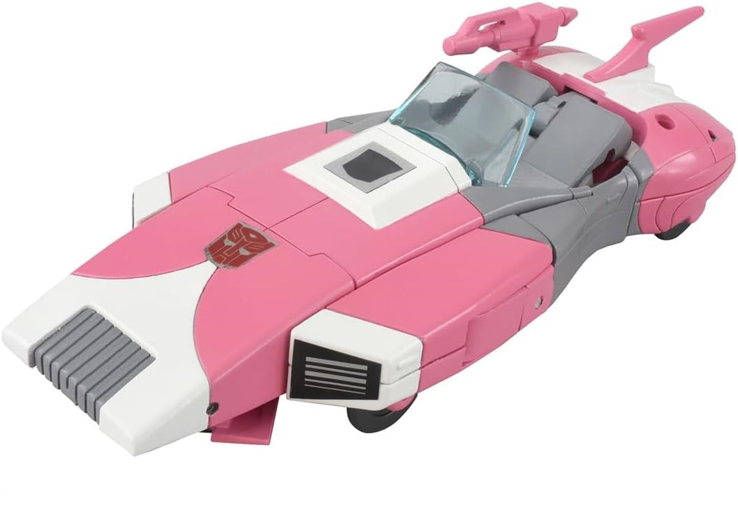 Pink and white Autobot Arcee Transformers toy in streamlined futuristic car mode