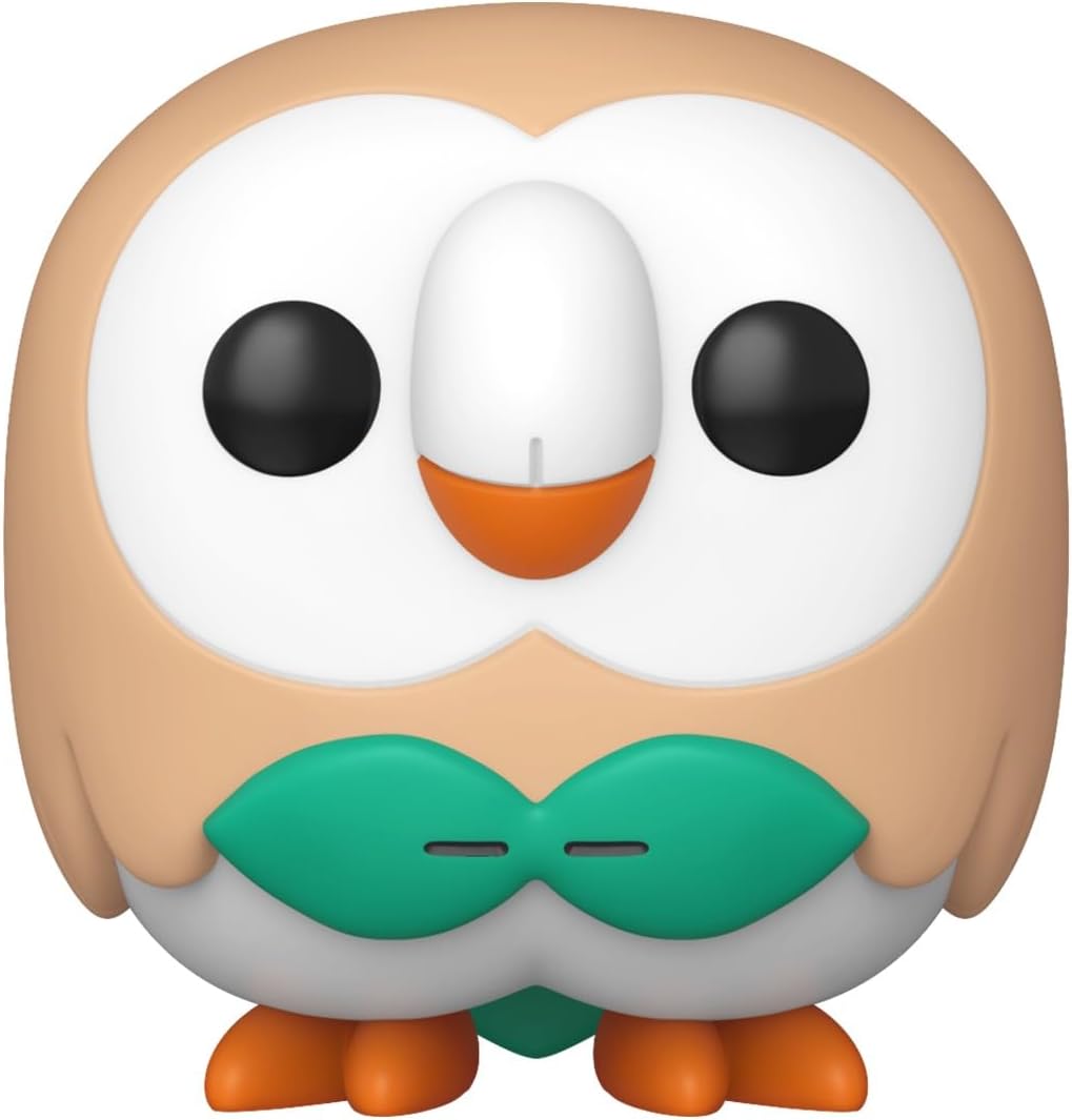 Rowlet Pokémon vinyl figure. The round brown owl has large eyes, an orange beak, and a green leaf bow tie