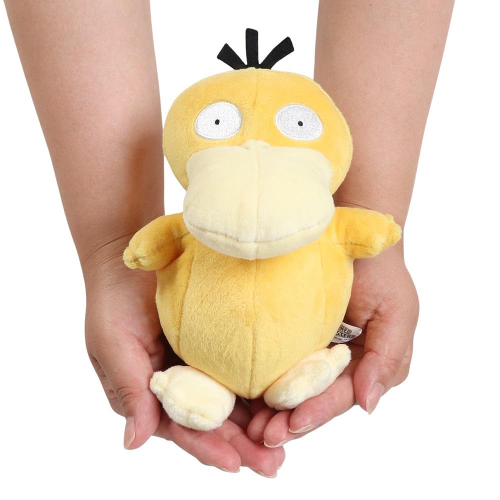 Yellow Pokémon Psyduck plush toy held in cupped hands