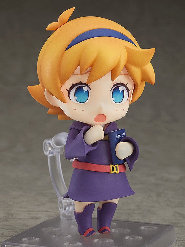 Close-up of Lotte’s smiling face and glasses with alternate parts