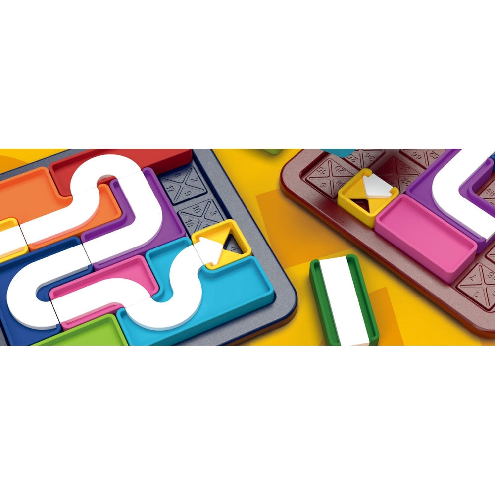 A colorful logic puzzle shows a complex S-curve white connection path built from various bright plastic tiles inserted into a numbered game grid