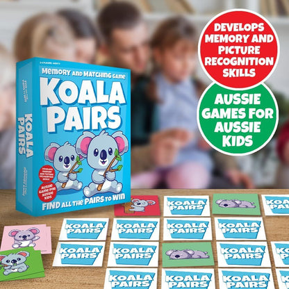 Koala Pairs memory game box and cards displayed on a table with a family playing in the background