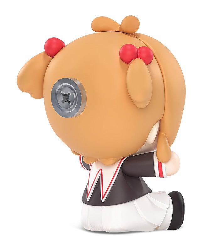 Chibi doll with orange hair styled in pigtails red bobbles and a screw for one eye wearing a black and white school uniform