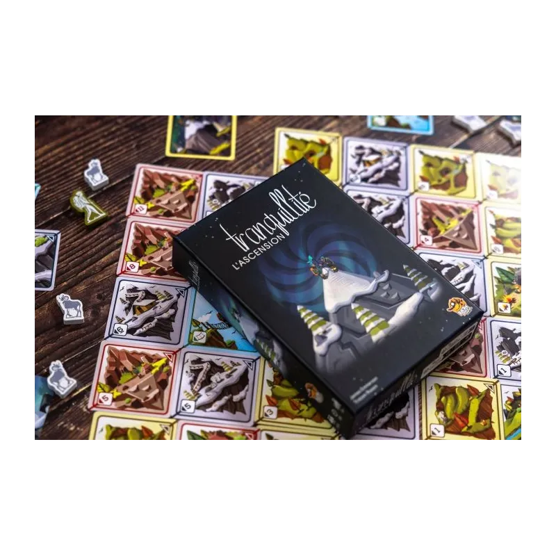 Tranquility: The Ascent game card box, card and pieces on table