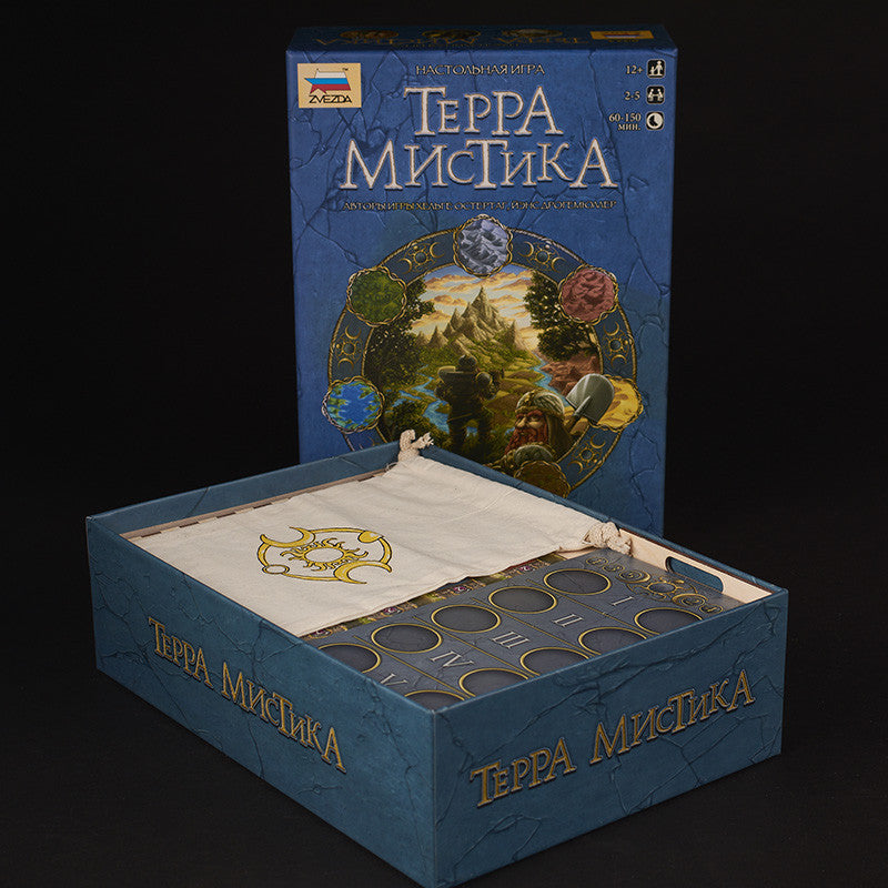 Terra Mystica game components neatly arranged with Laserox insert on a table