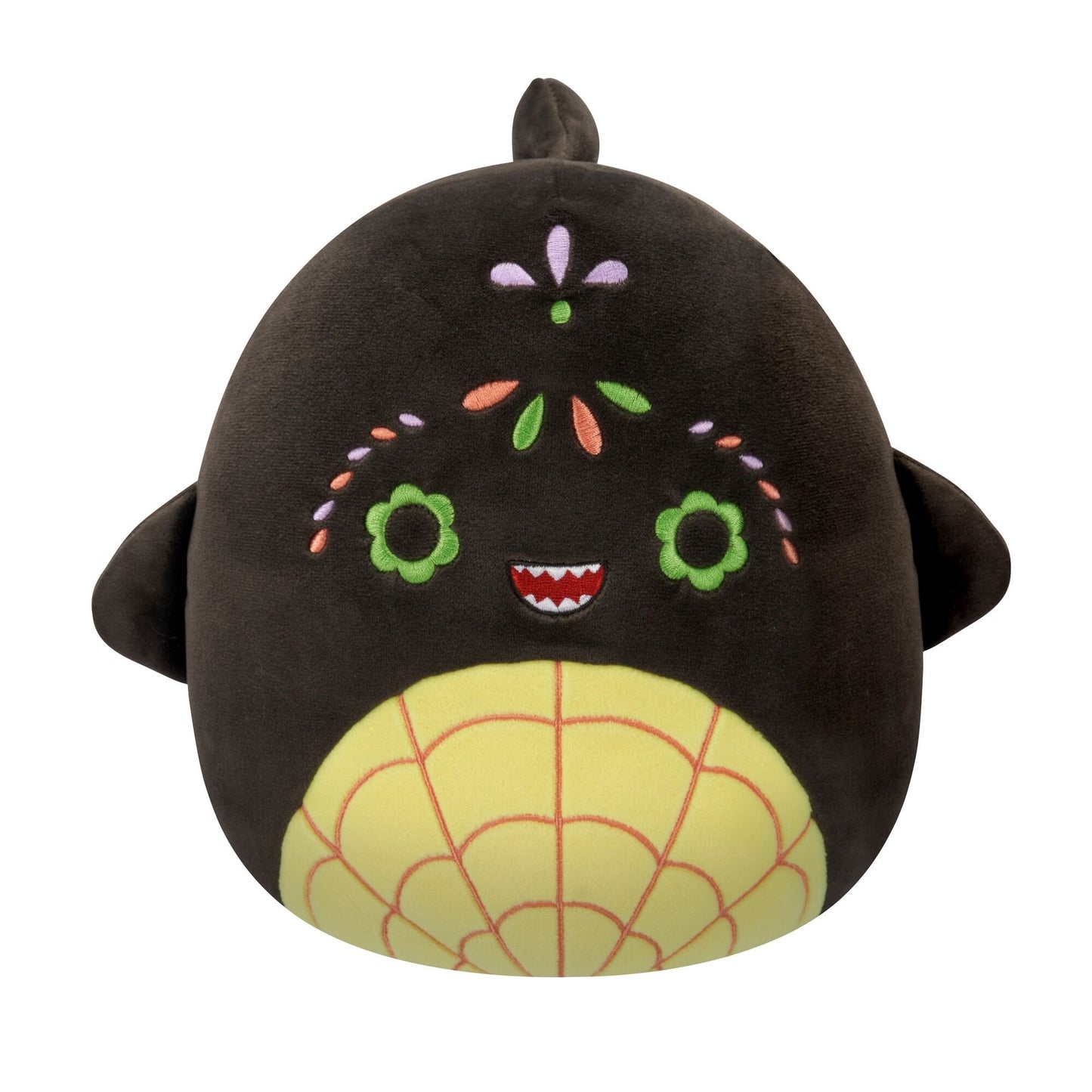 A black Squishmallow plush toy featuring a yellow spiderweb belly, green flower eyes, a toothed smile, and colorful embroidered floral patterns on its face