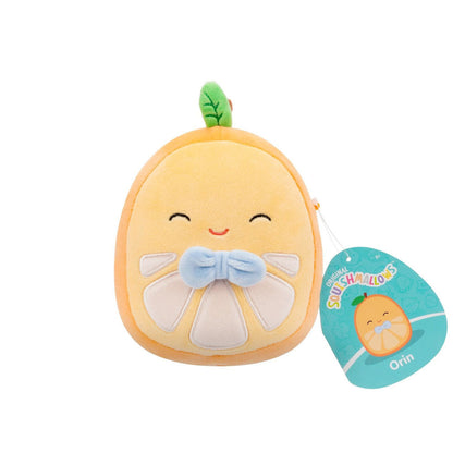 An orange slice Squishmallow plush toy, named Orin, smiling with a blue bowtie and a green leaf