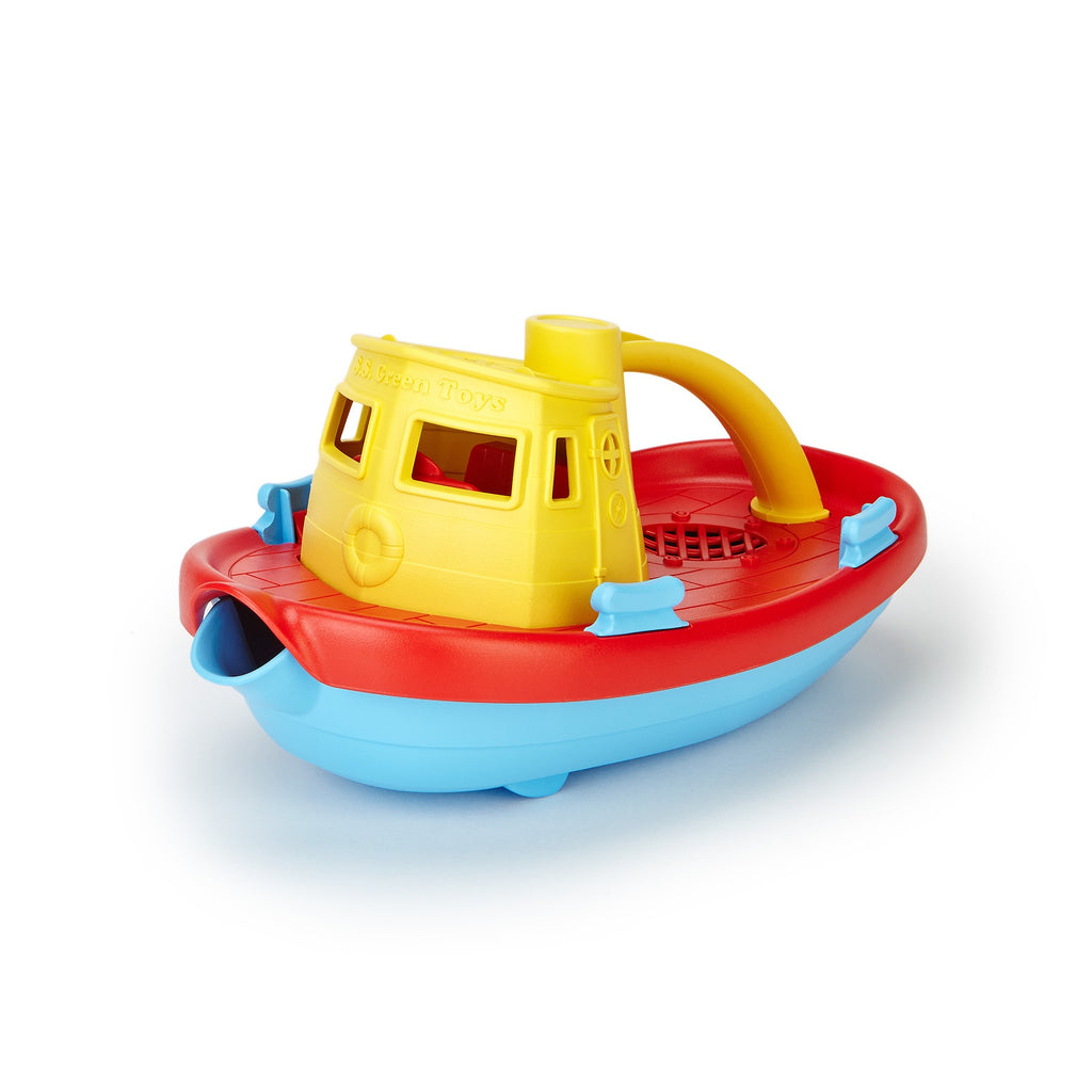 Colourful plastic toy tugboat by Green Toys, featuring a yellow cabin, red deck, and blue hull