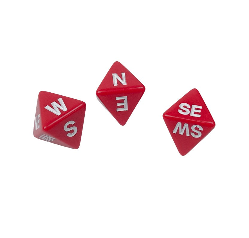 Three red d8 dice with white compass directions scattered