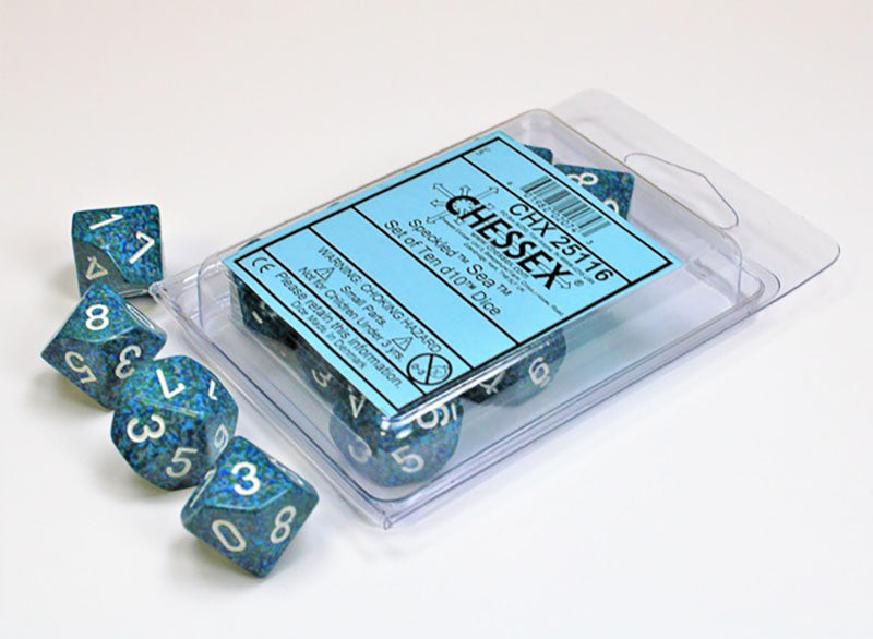 Teal blue speckled d10 dice, some loose and some in their clear Chessex 'Speckled Sea' packaging on a white surface