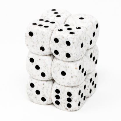 A stack of nine Chessex Arctic Camo 16mm D6 speckled white dice from a 12-piece set featuring black pips arranged on a plain white background