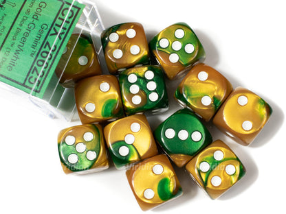 A set of twelve Chessex Gemini 16mm D6 dice in swirled gold and green with white pips, spilled from their clear plastic case