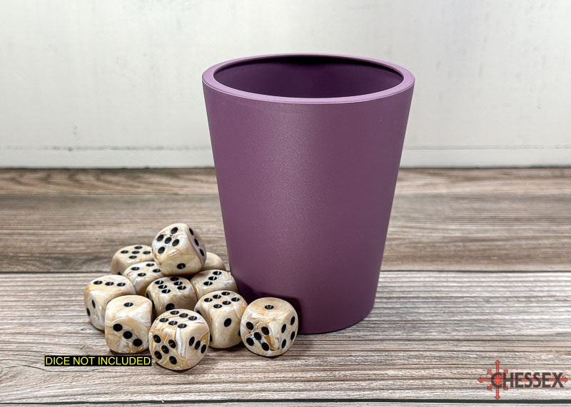 Purple dice cup next to a pile of beige marbled dice with black pips on a wooden table, text overlay: DICE NOT INCLUDED