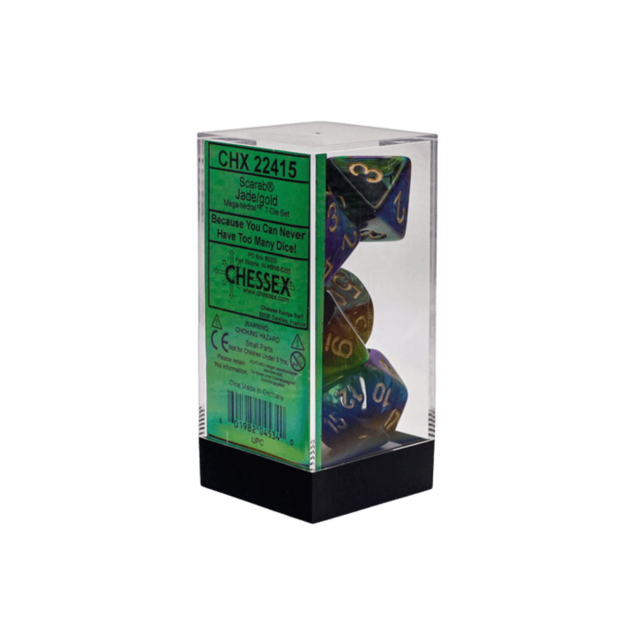 A clear plastic box holds a Chessex Scarab Jadegold Mega-hedral 7-Die Set, featuring polyhedral dice in shimmering green, blue, and gold colors, with a product label visible on the side
