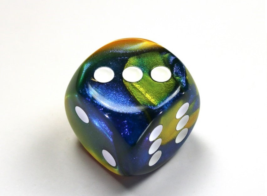 Masquerade Yellow and White die showing 2, 3 and 6 faces with white pips visible, on a white background