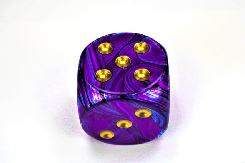 Purple and Gold die showing 5 and 3 faces with gold pips visible, on a white background