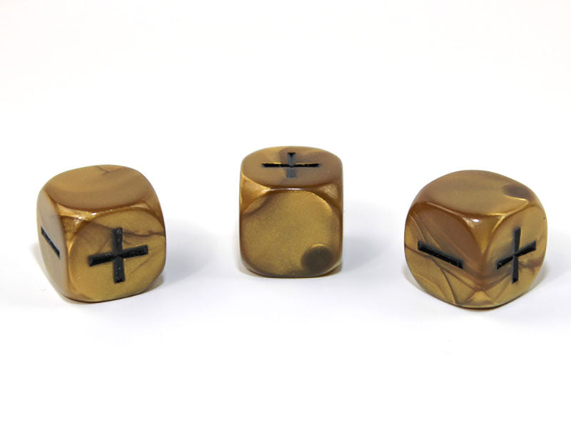 Gold die showing + and - faces on a white background