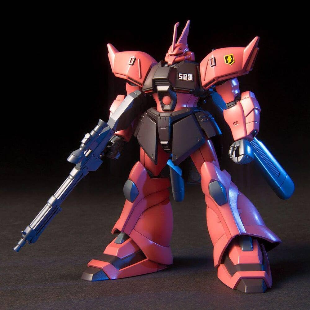Red and black mobile suit figure holding a rifle, illuminated against a dark background