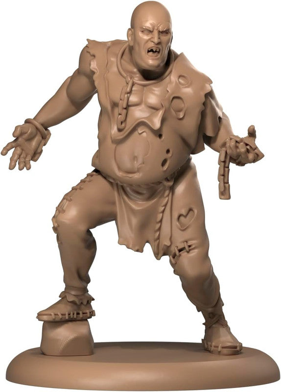 An unpainted miniature of a bald, snarling monster in tattered rags, with broken chains, in an aggressive pose