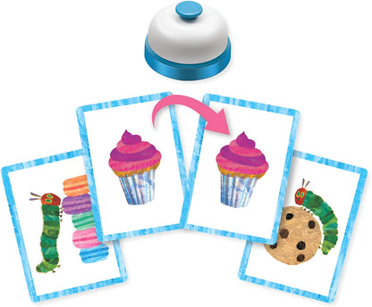 Game setup with four cards featuring The Very Hungry Caterpillar, sweets, matching cupcakes, and a blue desk bell