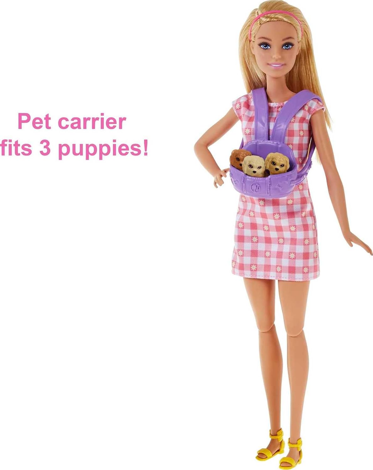 Barbie doll in pink dress carrying a purple front pet carrier with three puppies. Carrier fits 3 puppies