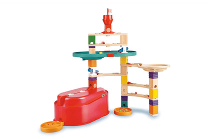 Colorful multi-level wooden marble run toy with plastic components, tracks, funnels, and a red base