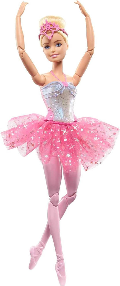 Blonde Barbie ballerina doll in sparkly pink tutu -  pointe shoes -  and pink crown -  arms raised in a dance pose