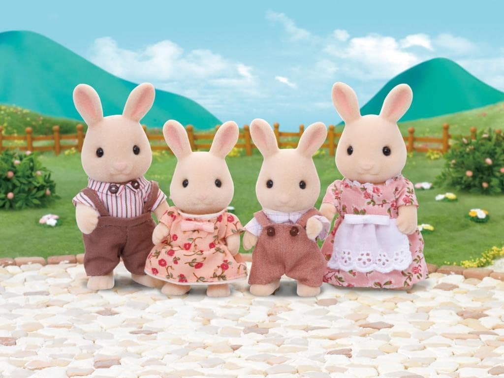 Flocked toy Milk Rabbit Family of four, dressed in clothing, standing on a patio in a green countryside diorama