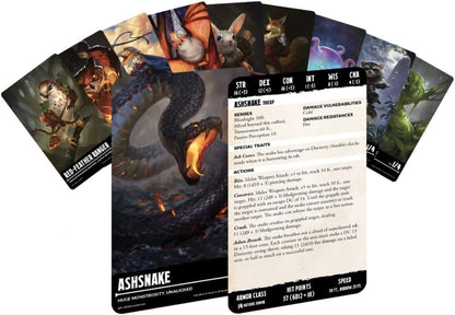 A large Ashsnake monster card depicting a dark snake with an open, fiery mouth, fanned out with several fantasy creature cards.