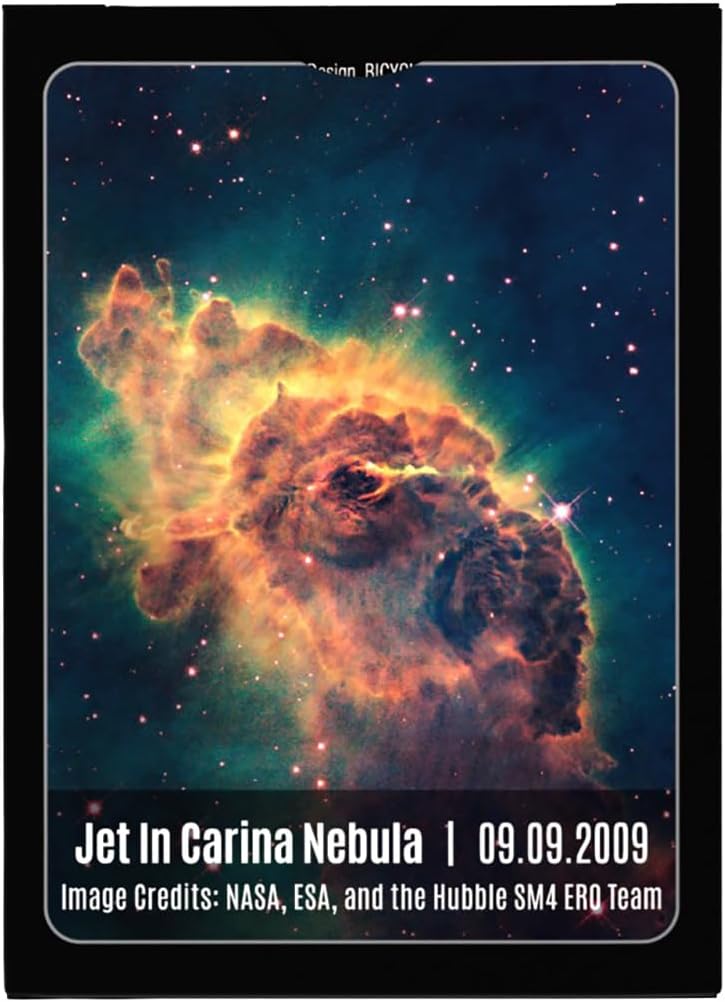 Hubble image of the Jet in Carina Nebula, showing large orange and green cosmic dust pillars