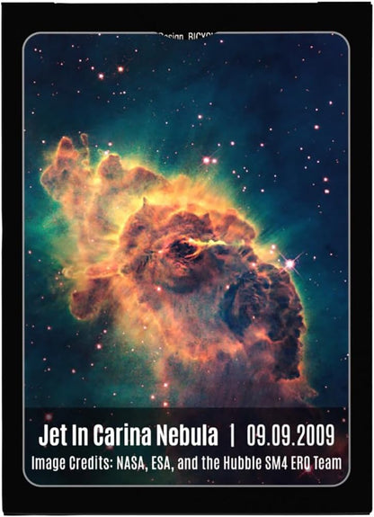 Hubble image of the Jet in Carina Nebula, showing large orange and green cosmic dust pillars