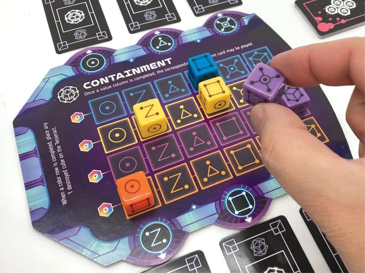 Tesseract game cards and player mat close-up
