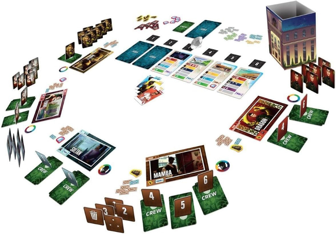 A tabletop game laid out with cards tokens and a building-shaped box featuring game components like character cards job cards and scoring markers