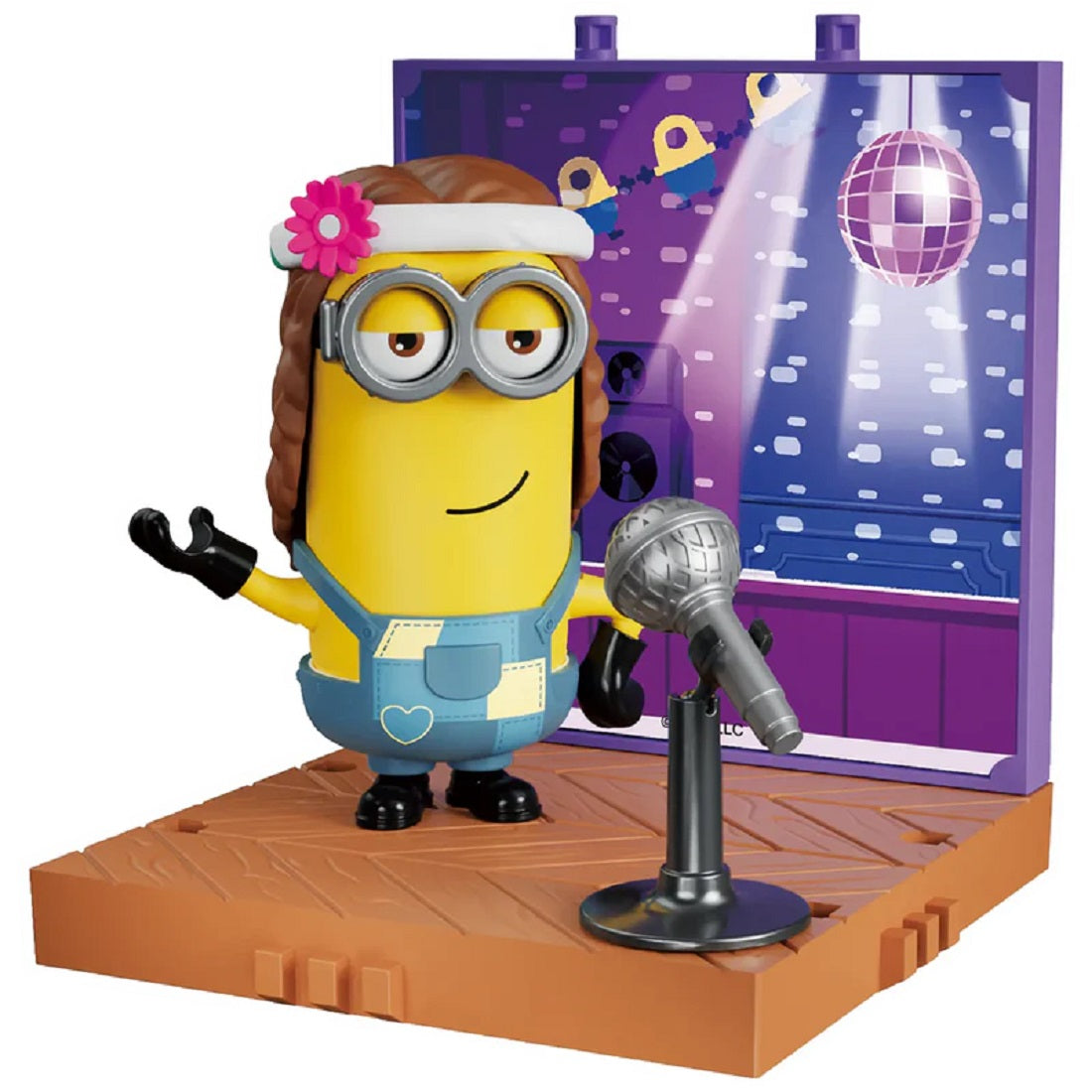 Minion figure dressed as a hippie singer, standing by a microphone on a stage with a disco ball backdrop