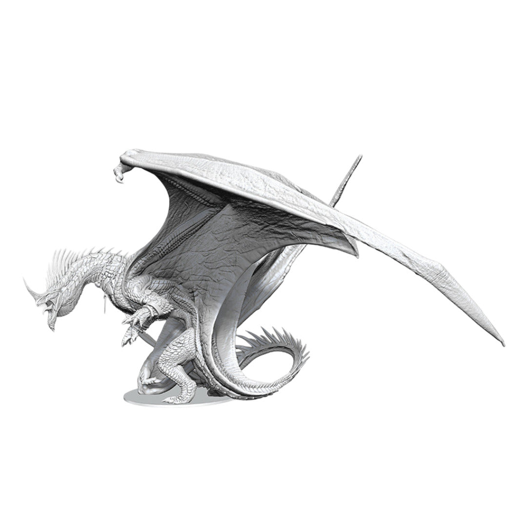 An unpainted Ancient Blue Dragon miniature features large extended wings, textured scales, and a curled tail ready for battle