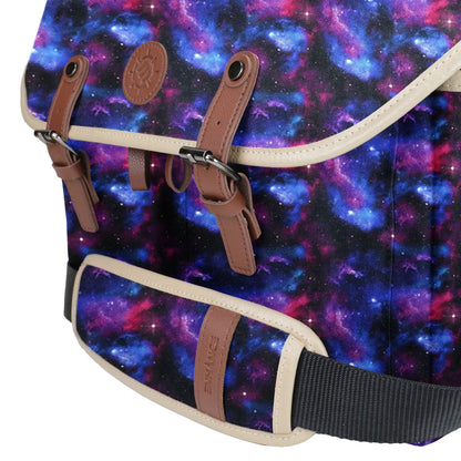 The Enhance Designer Edition DND bag features a colorful galaxy print flap secured by brown leather straps with metal buckles and highlighted by cream trim