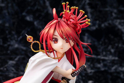 Detailed close-up of a red-haired anime figure in a white kimono holding a small sword