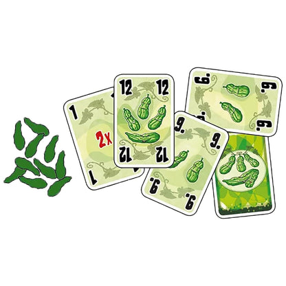 Five Cucumbers card game set with green cucumber-shaped playing pieces and multiple illustrated cards featuring numbers and cucumber art