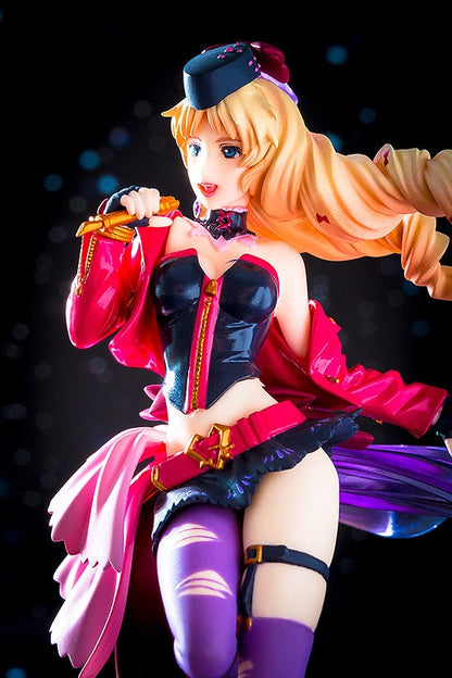 Anime figurine of a blonde woman with blue eyes wearing a black corset and short red jacket holding a golden microphone