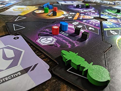 A sci-fi board game in progress, showing a cosmic board, colourful tokens, a green feather piece, and cards