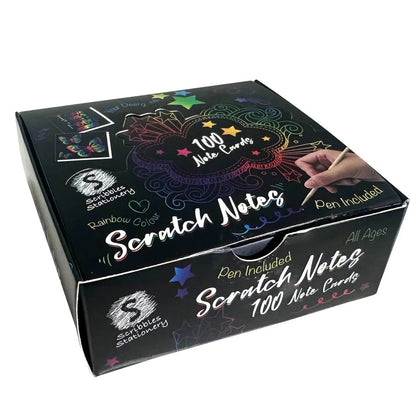 Box of Scratch Notes (100 cards) showing a hand using the stylus to reveal colorful rainbow designs underneath the black surface