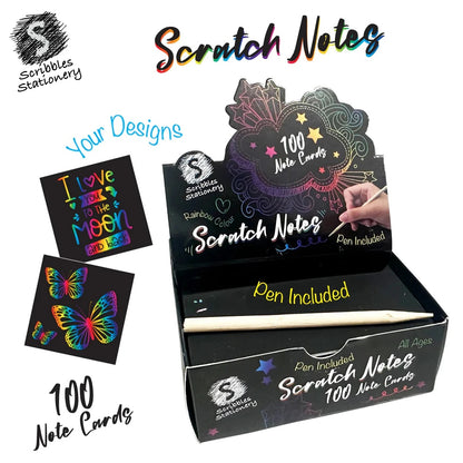Display box of 100 black scratch notes revealing rainbow designs, shown with wooden stylus