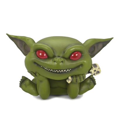 Green baby goblin creature with red eyes, sharp grin, holding a small skull, resting its chin